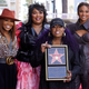 Missy Elliott, second from right, poses with manager Mona Scott-Young, left, and singers Lizzo and Ciara at a ceremony to award Elliott a star on the Hollywood Walk of Fame, Monday, Nov. 8, 2021, in Los Angeles, Calif.